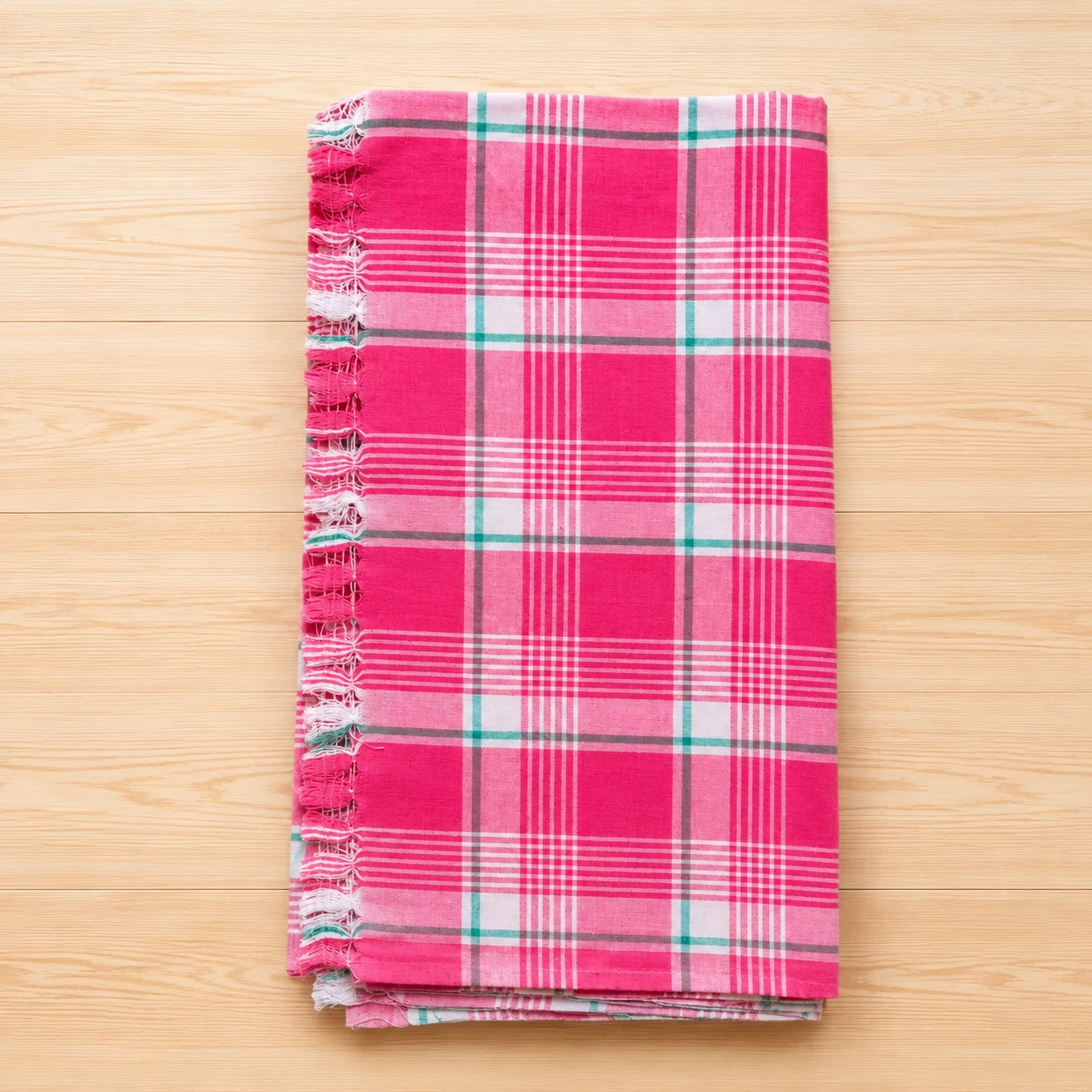 Pink checked cotton towel with classic checkered pattern