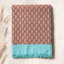 rust and turquoise leaf print cotton blanket