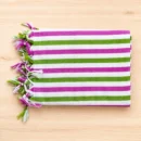 Premium pink and green striped cotton towel with white base and fringed edge