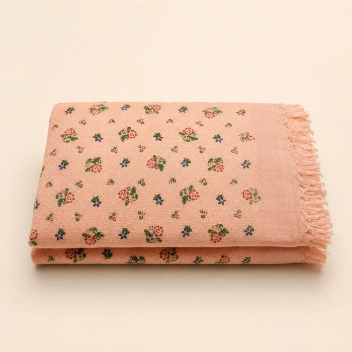 Premium peach printed cotton towel with floral and mini motifs