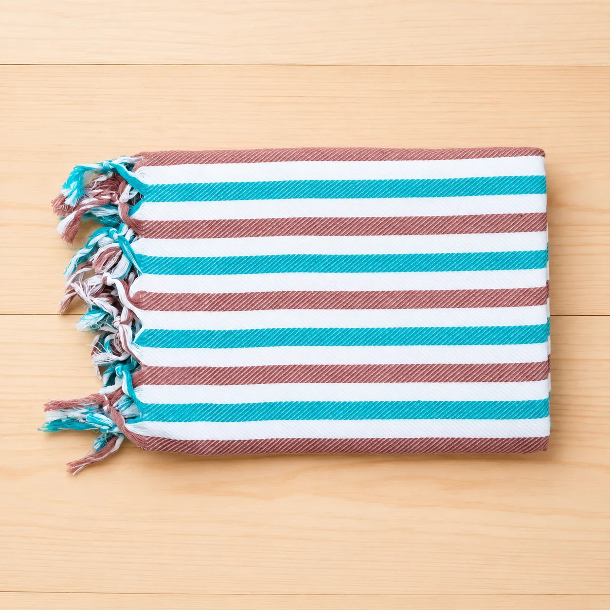 Premium teal blue and brown striped cotton towel with fringed edge