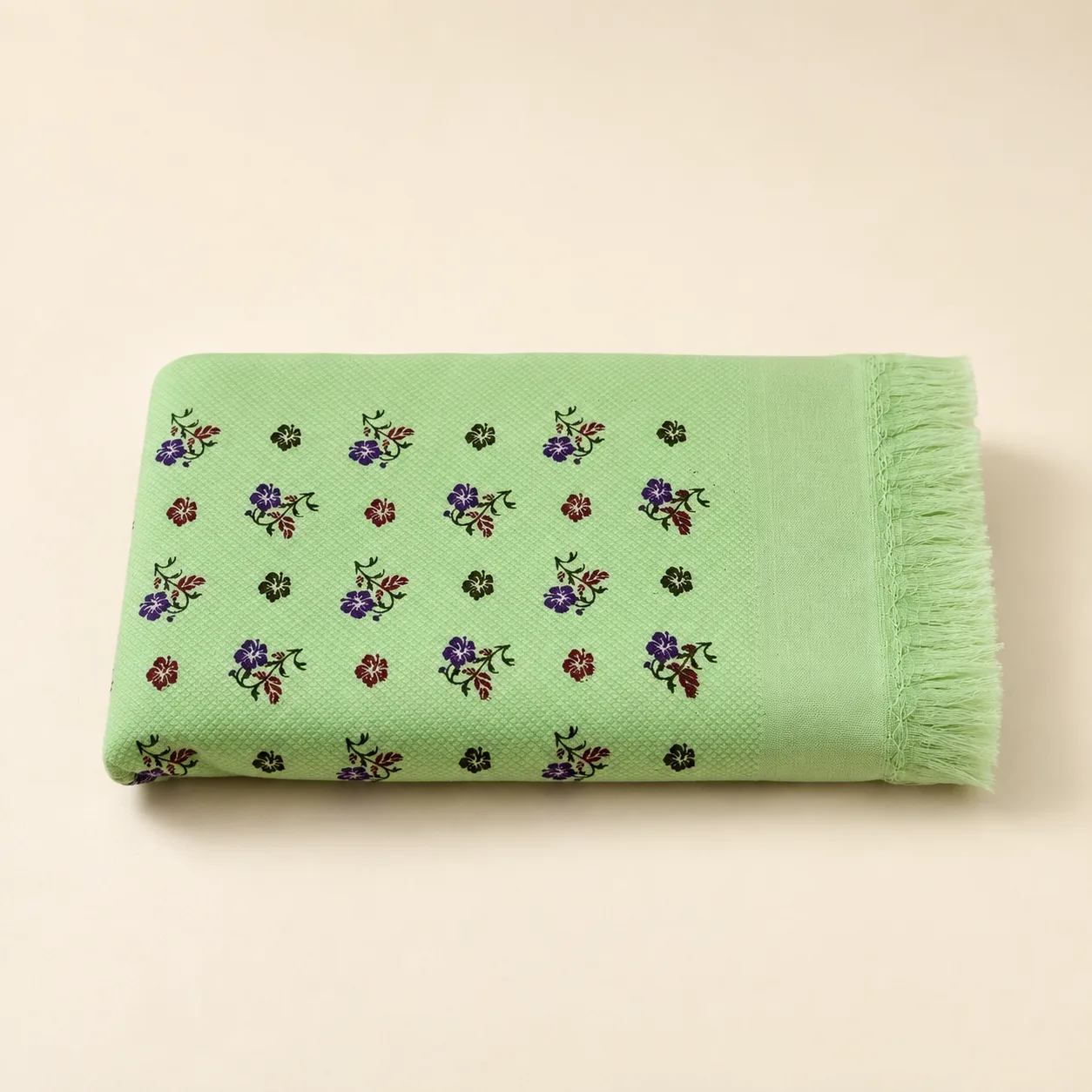 Premium light green printed cotton towel with colourful floral design