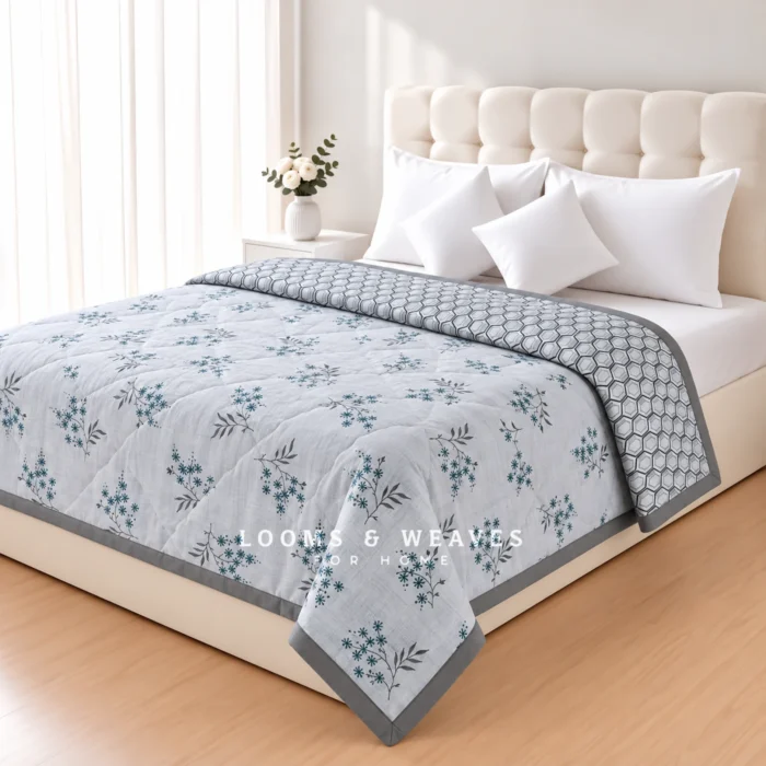 Light grey cotton dohar with blue floral print and grey honeycomb reverse pattern