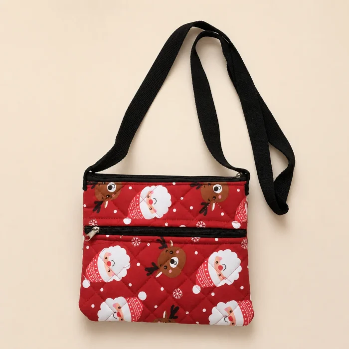 Red printed sling bag with Santa and reindeer design
